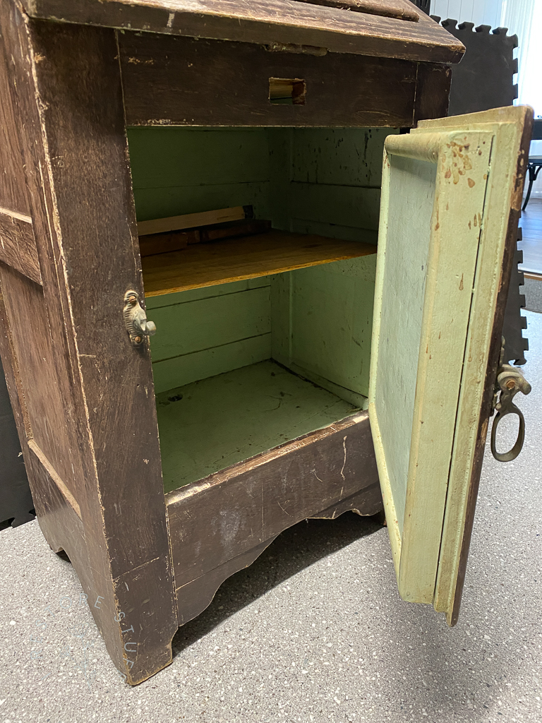 open door of old vintage fridge.